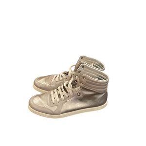 Silver Gucci Sneakers from 2007. Worn a handful of times.